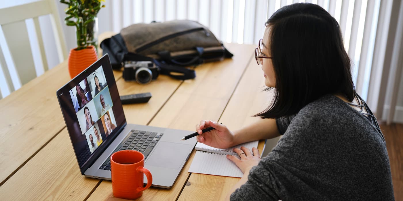 person working from home in a video meeting