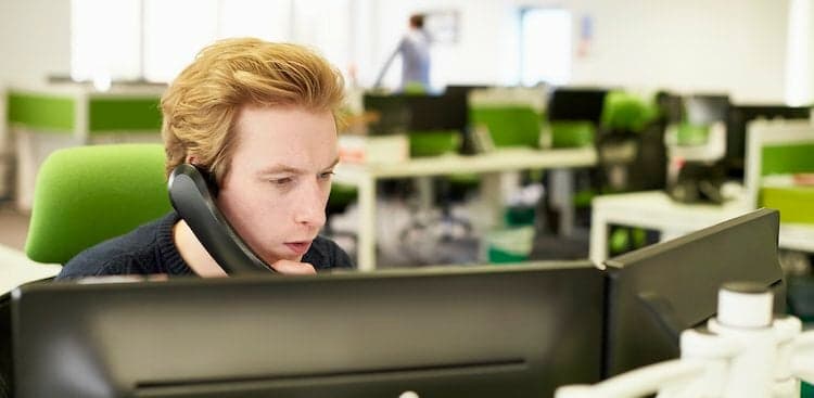 person on phone stressed