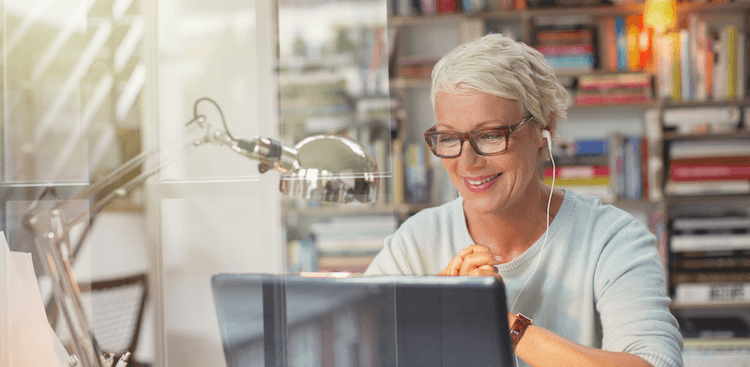 person sitting in front of a computer